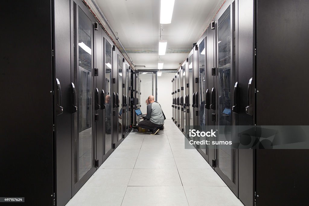 Computer administrators Server specialists working on servers in a server room Computer Lab Stock Photo