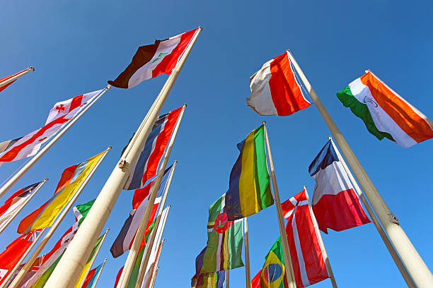 istock Colorful world international flags waving in the sky 497160825