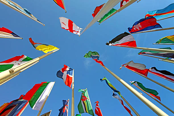 istock Colorful world international flags waving in the sky 497160827