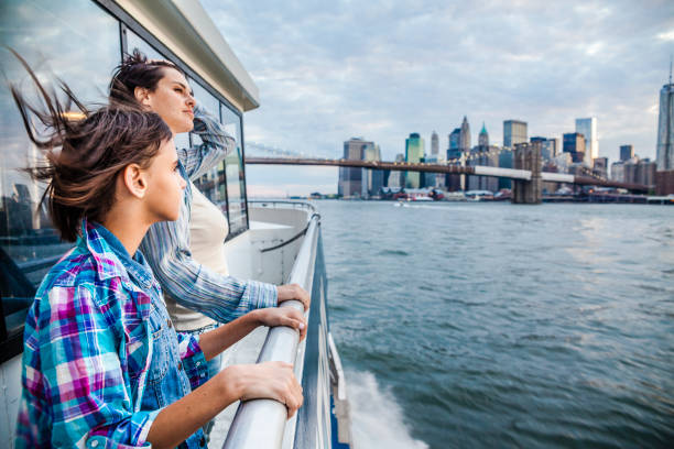 Mother and daughter at ferry at Hudson River