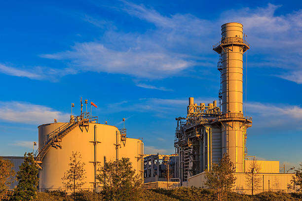 istock Natural gas fired turbine power plant,fall,field,CA 497176574