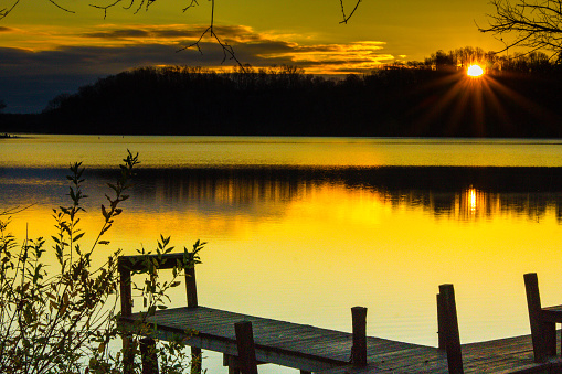 Sun rising above Lake Logan at Hocking Hills State Park, Ohio. Hocking hills is a very popular tourist attraction.