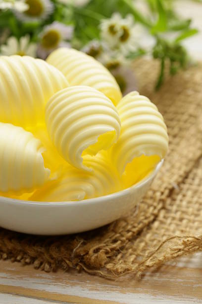 istock fresh yellow dairy butter in a white bowl 497179511