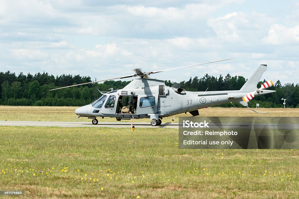 AgustaWestland AW109 Kallinge, Sweden - June 01, 2014: Swedish Air Force air show 2014 at F 17 Wing. AgustaWestland AW109 on runway. Adults Only Stock Photo