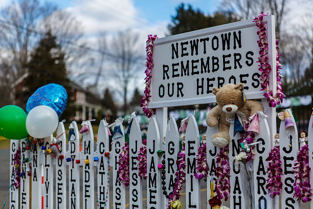 Sandy Hook Elementary School shooting memorial in Newtown, Connecticut Newtown, USA - December 23, 2012: Sandy Hook Elementary School shooting memorial in Newtown, Connecticut on December 23, 2012 after Sandy Hook Elementary School shooting. The massacre took place on December 14, 2012 when a gunman murdered 20 children and 6 adults staff members. gunman photos stock pictures, royalty-free photos & images