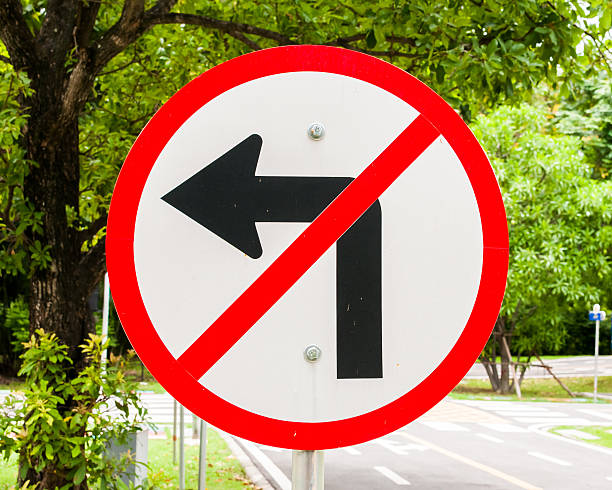 istock Prohibition no Left turn signs with natural bachground 497182418