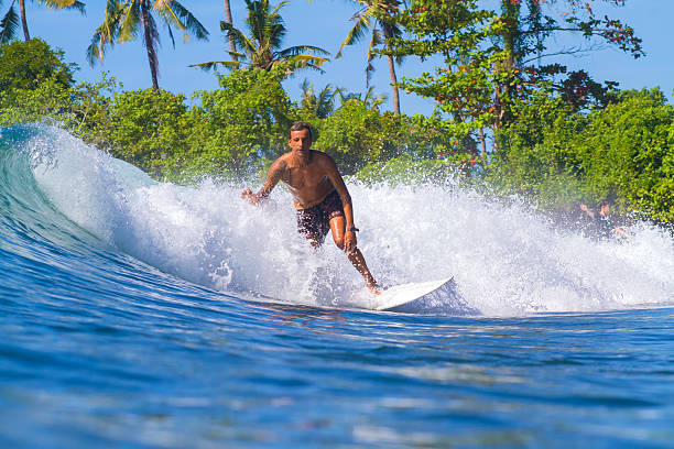istock Surfing a Wave. Bali Island. Indonesia. 497183497