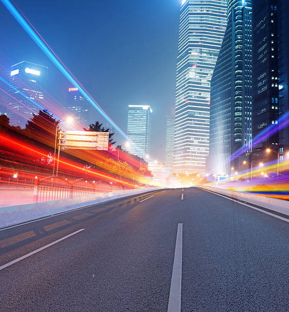 istock Asphalt road and modern city 497185075