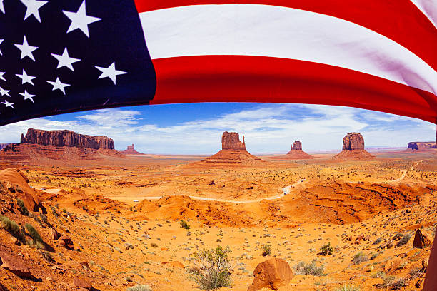 istock Monument Valley Landscape with American Flag, USA Landmark 497185193