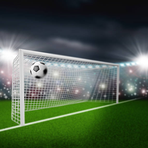 istock soccer ball flies into the goal 497185475