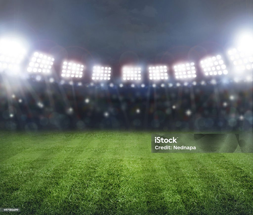 stadium in lights Green soccer stadium, illuminated field, arena in night Soccer Stock Photo