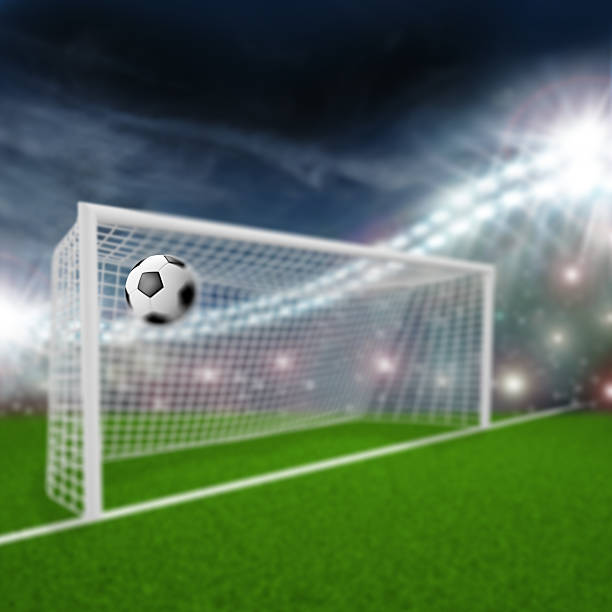 soccer ball flies into the goal