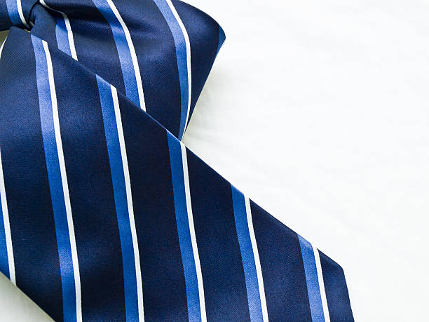 istock Close-up of striped blue and white tie isolated on white 497196883