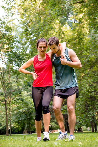 istock Sport injury - helping hand 497197269