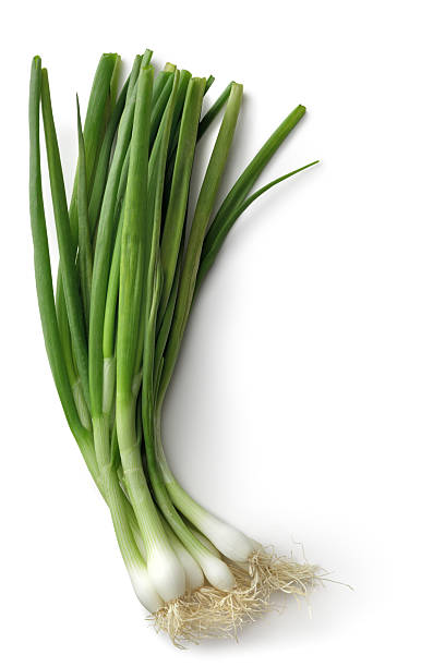 овощи: зелёный лук - heap studio shot vertical directly above стоковые фото и изображения