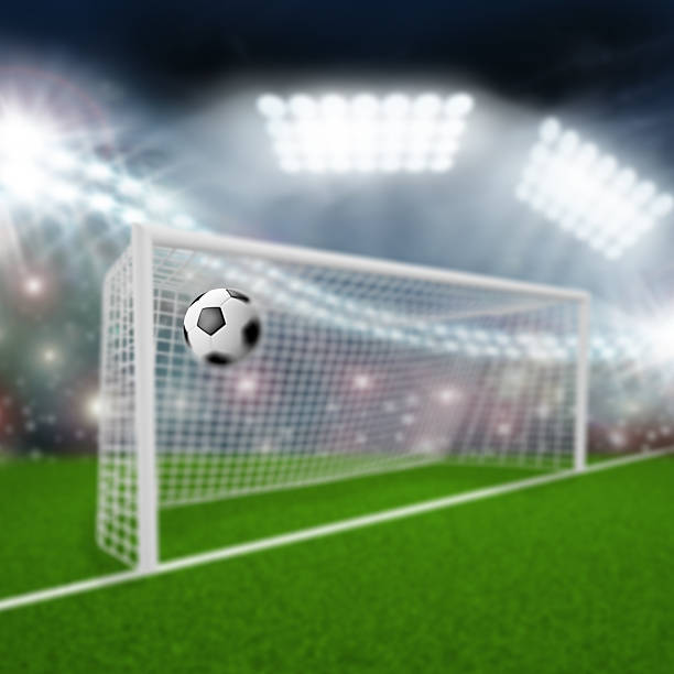 istock soccer ball flies into the goal 497198199