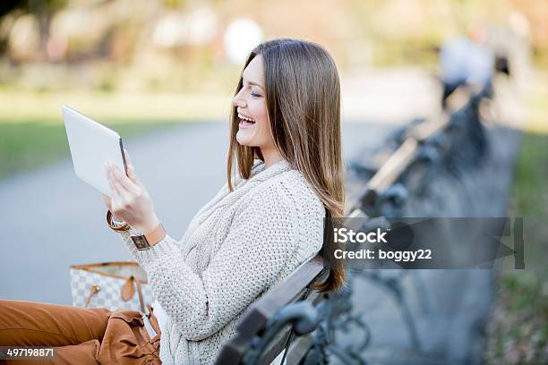 Young Woman In The Park With Tablet Stock Photo - Download Image Now - Adult, Adults Only, Beautiful People