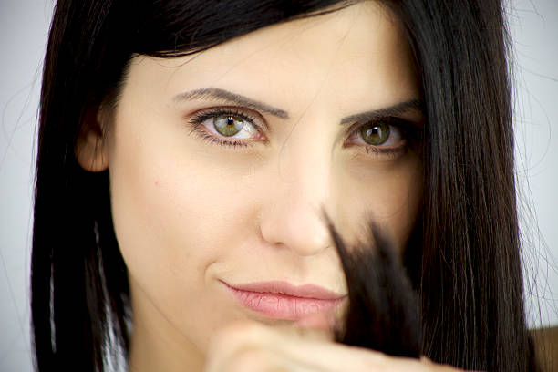 The woman smiling at the camera.