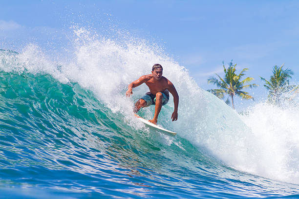 istock Surfing a Wave. Bali Island. Indonesia. 497199555