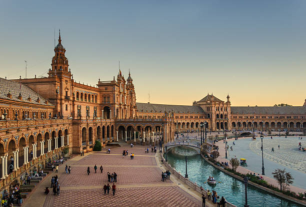 Seville Plaza Mayor Plaza Mayor of Seville at sunset spain stock pictures, royalty-free photos & images