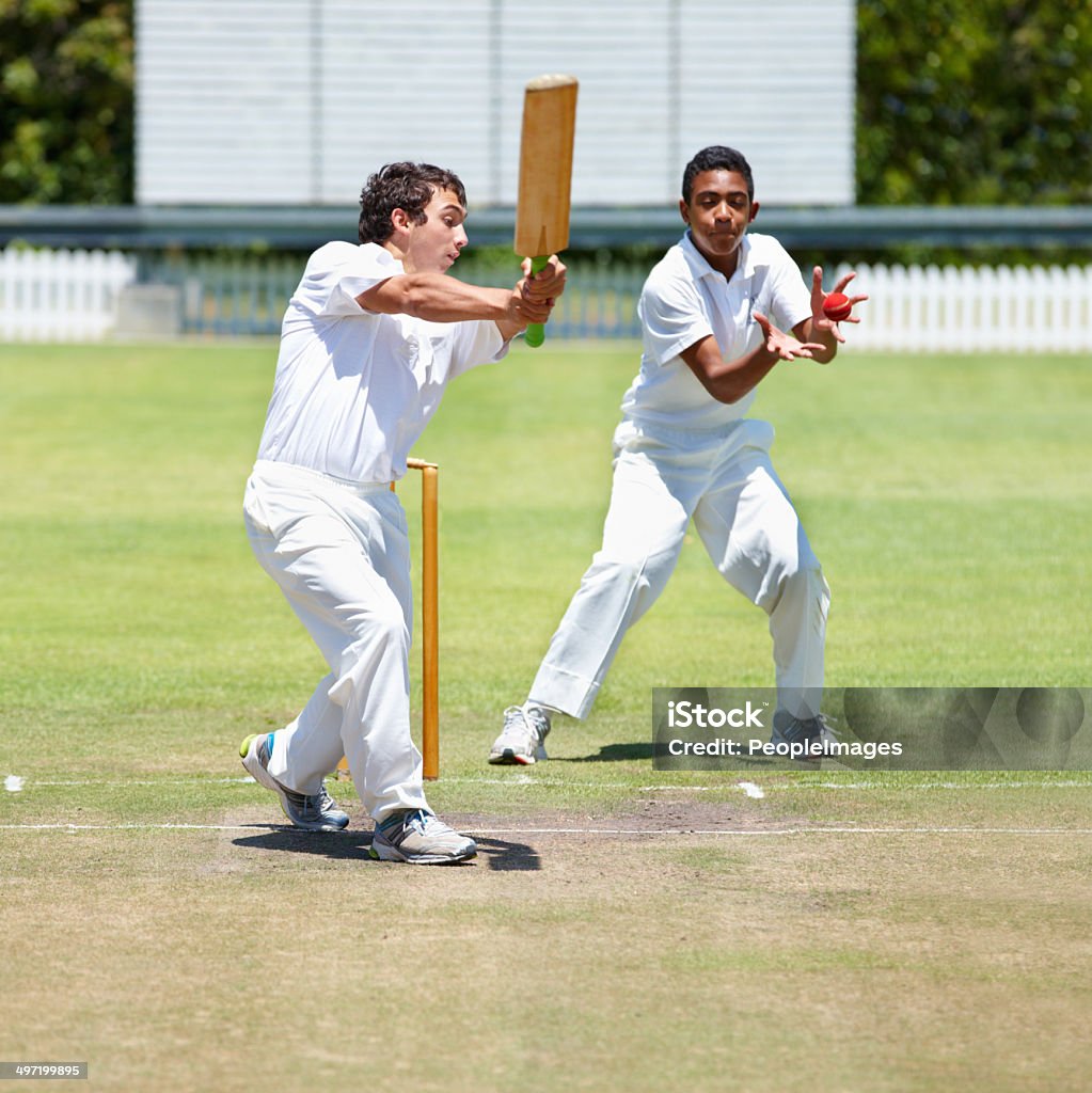 Will he get caught out? A group of teenagers playing cricket on a fieldhttp://195.154.178.81/DATA/i_collage/pi/shoots/783317.jpg Sport of Cricket Stock Photo