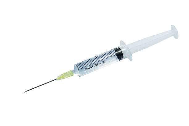 istock Medical Syringe with serum or liquid 497200247