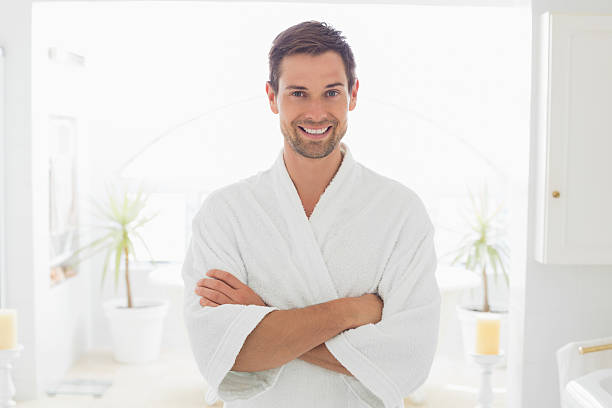 istock Portrait of a smiling young man in bathroom 497200941
