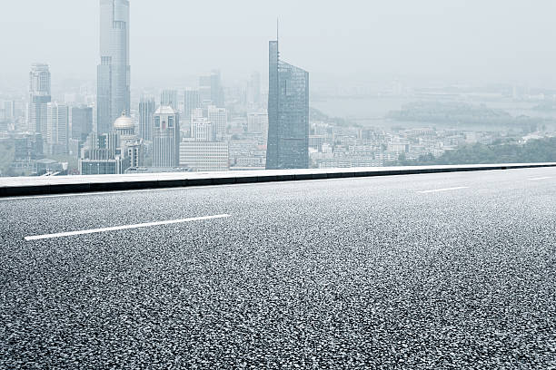 istock urban road with modern city 497201063