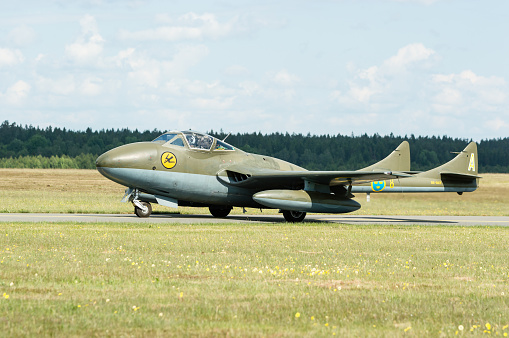 Kallinge, Sweden - June 01, 2014: Swedish Air Force air show 2014 at F 17 Wing. de Havilland Vampire jet plane. On runway.