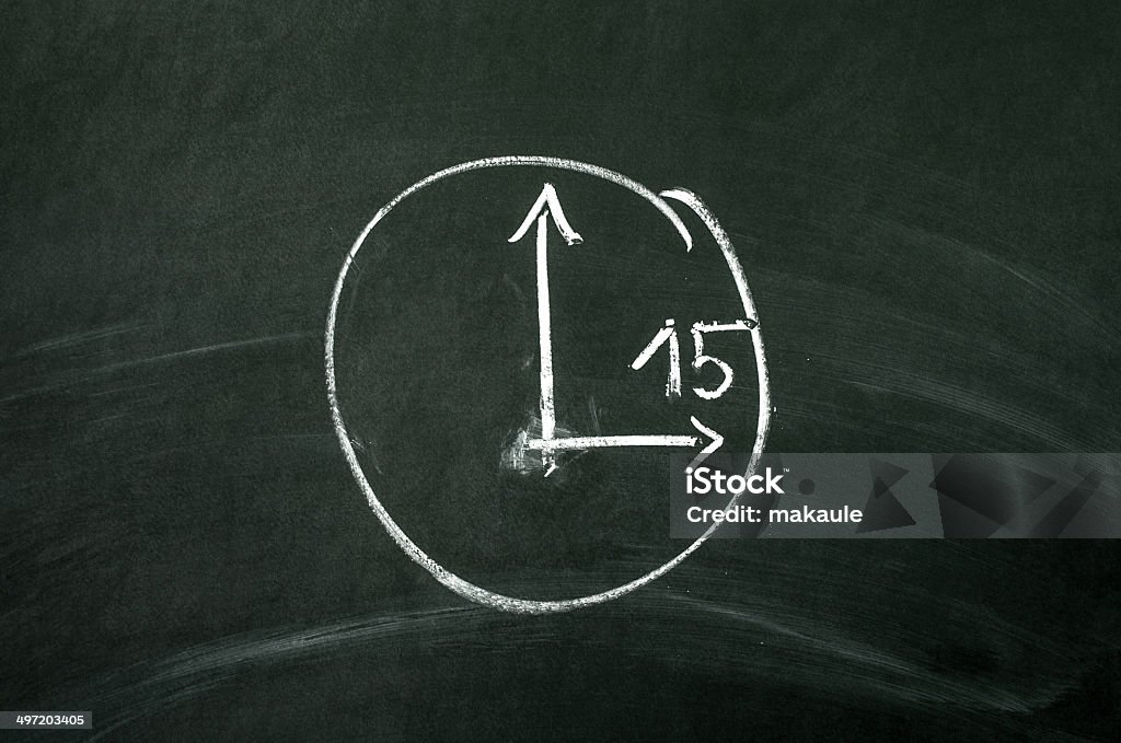Time concept Time concept. The clock drawed on blackboard Number 15 Stock Photo