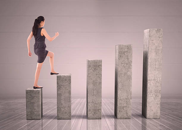 istock Composite image of businesswoman stepping up 497203935