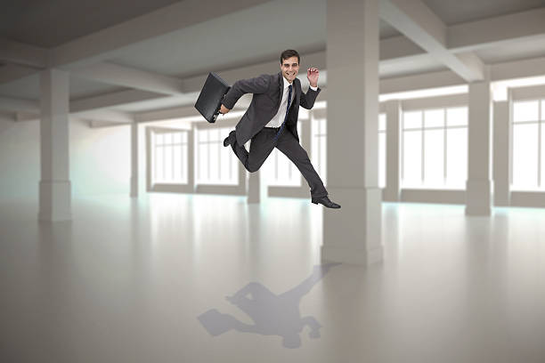 istock Composite image of cheerful businessman in a hurry 497203961