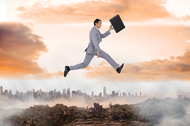 istock Composite image of businessman running with a suitcase 497203997