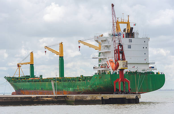 istock Merchant ship in the port 497208813