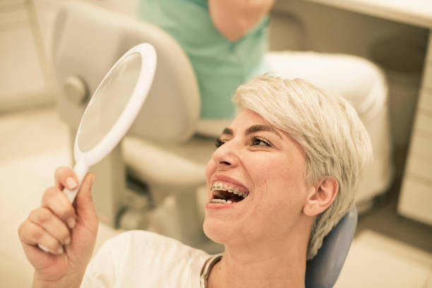 istock Happy Young Woman With Retainer 497210321