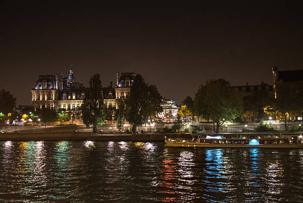 istock River Seine, Paris, night with red, white and blue reflections 497210376