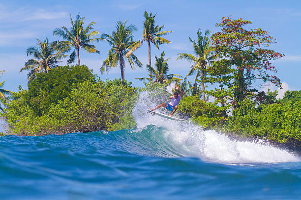 istock Surfing a Wave. Bali Island. Indonesia. 497211367