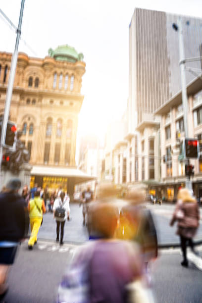istock Sydney downtown, blurred intersection people and traffic 497211532