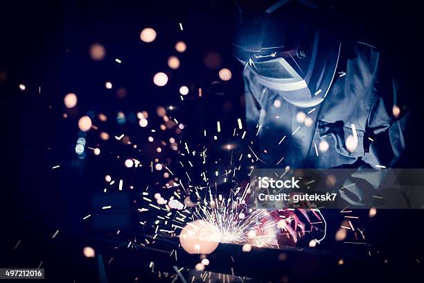 Employee Welding Steel Stock Photo - Download Image Now - Welder, Welding, Sparks