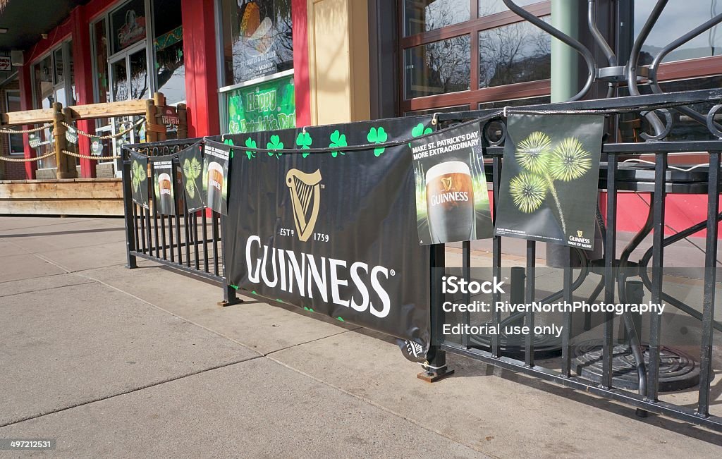 Guinness Fort Collins, Colorado, USA - March 17, 2014: A Guinness banner and Saint Patrick's Day paraphernalia in downtown Fort Collins. Guinness is Ireland's largest brewer with operations around the world. American Culture Stock Photo