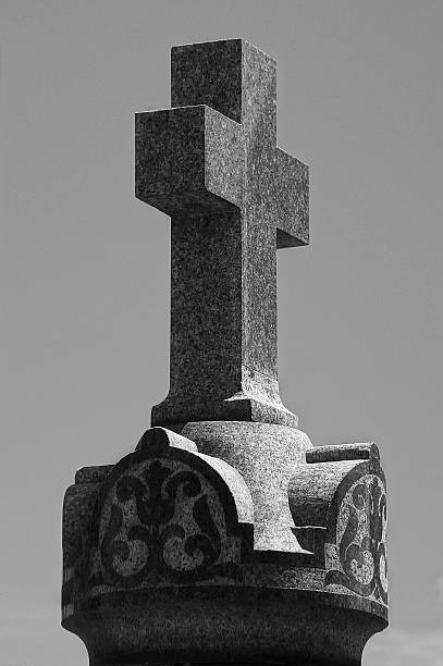 istock Marble Cross in the cemetery 497212545
