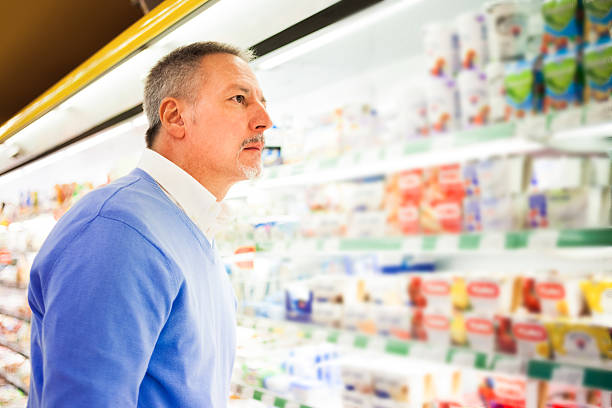 istock Man shopping in a supermarket 497212647