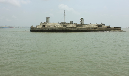 Cross Island is an uninhabited island located in the Mumbai harbour of Maharashtra. The Cross island lies exactly between the coast at Dockyard road and Elephanta island. The Cross island is host to an oil refinery and several large gashholders.