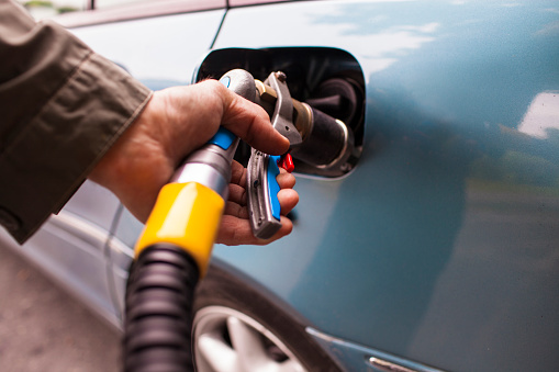 Refueling  car with LPG gas at a station