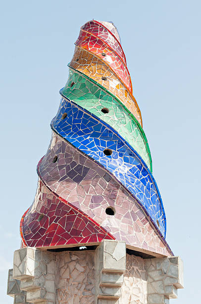 Detail of fireplace tiles and Antonio Gaudi