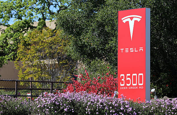 Tesla Motors World Headquarters Palo Alto, California, USA – March 18, 2014: The Tesla Motors World Headquarters in Palo Alto. Tesla Motors is an American company that designs, manufactures and sells electric cars and related components. elon musk photos stock pictures, royalty-free photos & images
