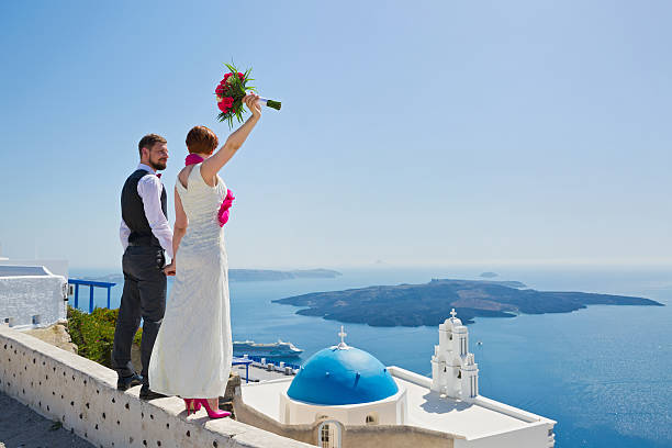 istock Wedding couple in Santorini, Greece 497215758