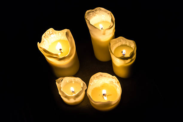 istock Candles at night isolated in the dark background 497220170