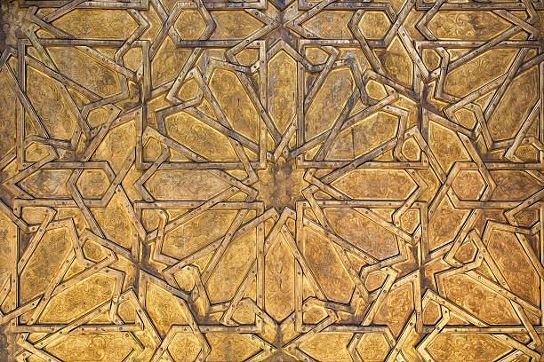 istock Golden metal with intricate oriental pattern. 497221774