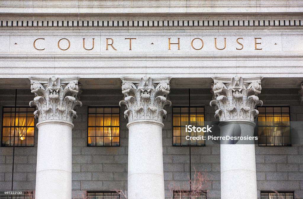 Courthouse facade. Facade of courthouse with columns. Backgrounds Stock Photo